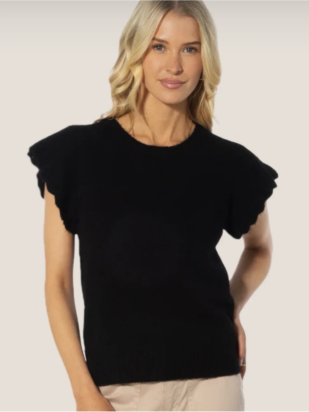 Black Ruffle-Sleeve Knit Sweater.